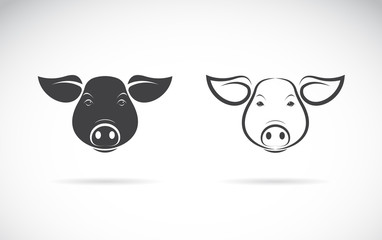 Obraz na płótnie Canvas Vector of a pigs head design on a white background. Farm animals. Pig logo or icon. Easy editable layered vector illustration.