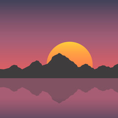 Obraz premium sunset in the mountains with a lake