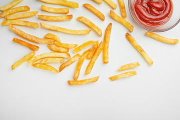french fries and sauce isolated on white, top view