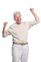 Happy senior man posing on white background