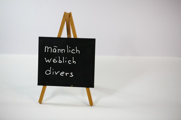 male, female, diverse, m / w / d, on slate, white background