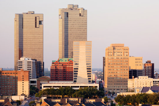 Cityscape and tall buildings at sunset, Fort Worth, Texas. 