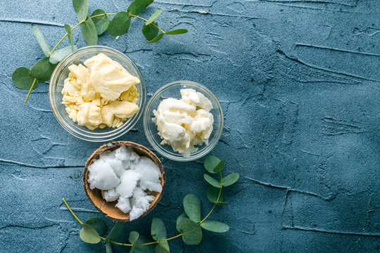 diy body butter with ingrdients on concrete background
