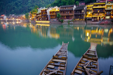 Fototapeta na wymiar Old boat at river in Fengfuang town, China