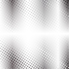 The stylized metal surface of gray dots