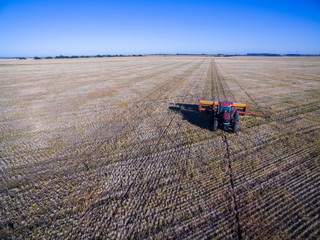 Tractor and seeder, direct sowing in the pampa, Argentina