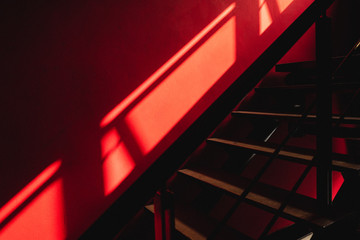 Fototapeta premium Red wall and stair can be used as background