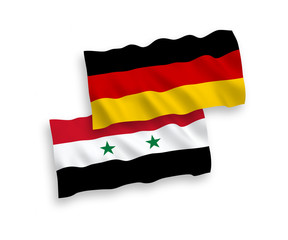 National Vector Fabric Wave Flags Of Germany And Syria Isolated On White Background. 1 to 2 proportion.