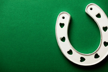 St Patrick's Day green background with lucky horseshoe