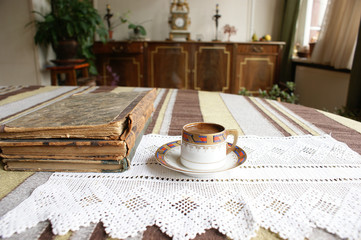 antique book and cup of coffee