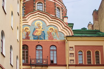 Image of a fragment of the facade of the Church of St. John the theologian with the icon of the Mother of God, St. Petersburg, Russia