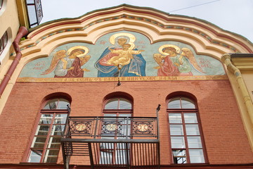 Image of a fragment of the facade of the Church of St. John the theologian with the icon of the Mother of God, St. Petersburg, Russia