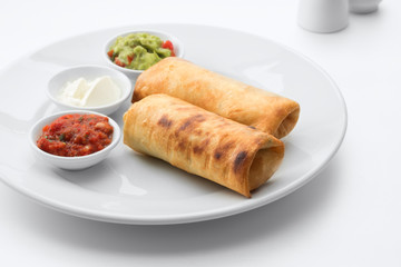 close up view of nice fresh yummy Mexican burritos on white back