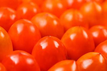 Fresh ripe persimmons in market. Persimmons background.