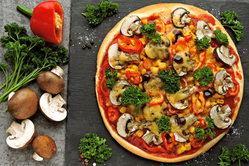 Vegan pizza with mushrooms, vegetables and herbs. Keto diet. Pegan diet.