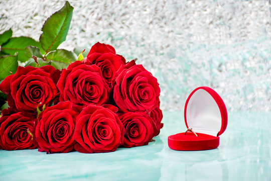 Red roses with boke background. box with a ring. copy space. 8 March Women s Mother Day