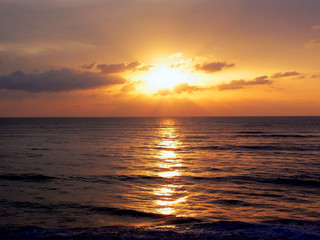 sunset on the coast of the beach bay of the city of Cadiz, Andalusia. Spain. Europe