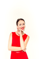 Portrait pretty woman sends air kiss with red balloon heart shape over blue background