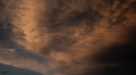  blue sky with orange clouds