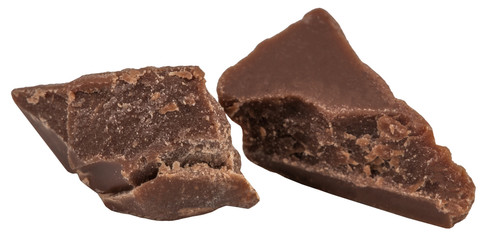 Broken chocolate pieces isolated on white background
