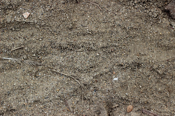 Sand gravel ground deposit traces surface texture 