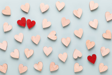 Happy Valentines day background. red hearts on white wooden background.