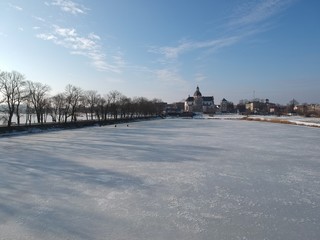 Aerial view of the frozen ponds in Nesvizh in winter. Minsk Region, Belarus. Site of residential castle of the Radziwill family. 