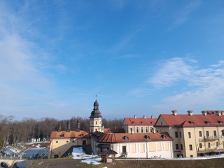 Obraz premium Aerial view of Nesvizh Castle in winter. Minsk Region, Belarus. Site of residential castle of the Radziwill family. 