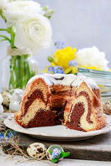 Traditional Easter cake with icing and chocolate filling.