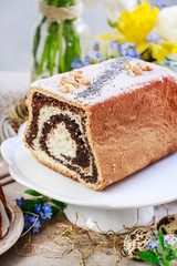 Poppy seed cake on easter table.