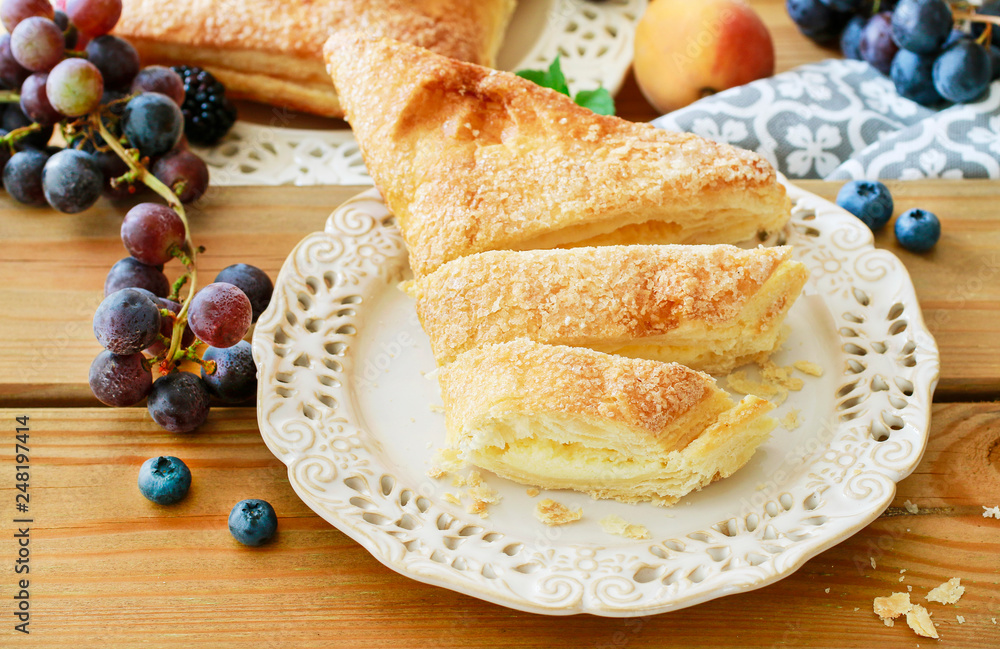 Canvas Prints delicious puff pastry cakes filled with cheese and fruits.