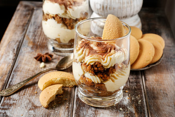 Tiramisu dessert in glass jar.