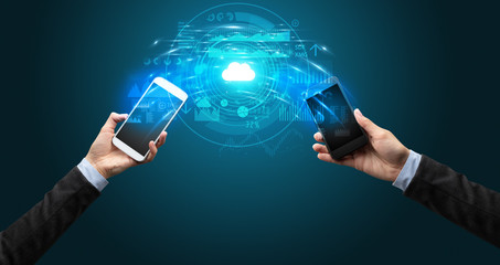Two mobile phones syncing through the cloud