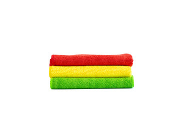 Stack of bright microfiber cloths. Isolated on white background. Place for text.