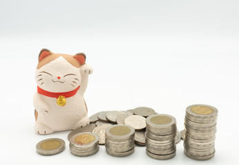 Japanese fortune wealth cat figure ( Maneki Neko) with stacking coins