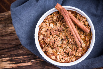 Homemade baked apple with oats