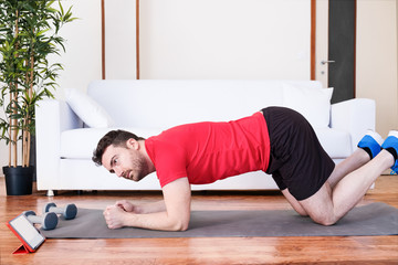Man doing push ups at home