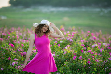 Girl in pink dress and vintage Cap