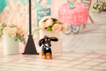 Portrait of a little cheerful birthday girl with the first cake. Eating the first cake. Smash cake.