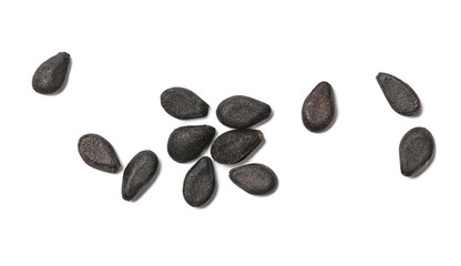 Black organic sesame seeds isolated on white background, macro and top view