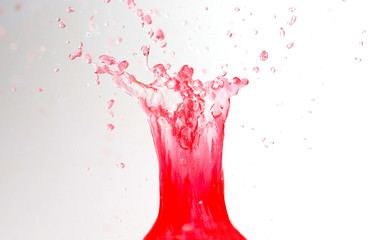 Beautiful splashes of red liquid