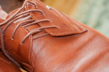 close-up classic brown leather shoes. Men's style. Professions. To prepare for work, to the meeting.