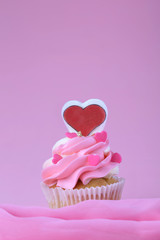 Cupcake on pink background
