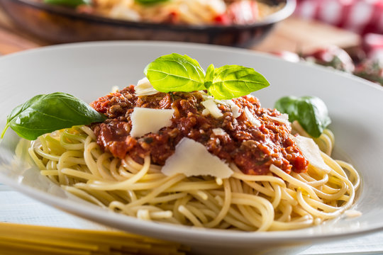 Close up italian pasta spaghetti bolognese in white plate