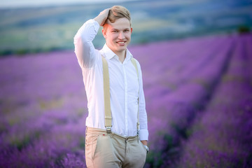 Happy farmer in his lavender plantation in a sunny day