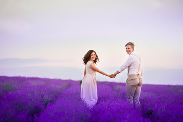 Lavender flowers blooming field and two trees uphill. Valensole, Provence, France, Europe.