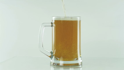 Glass of beer on a isolated white background