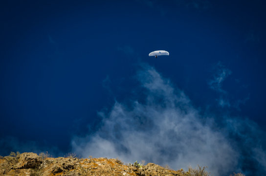 A paraplan in a blue sky