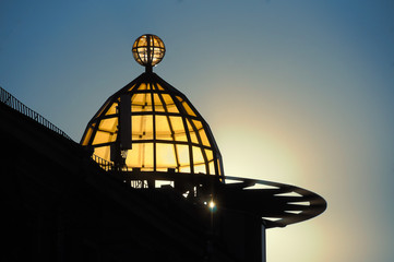 Transparent dome of the building in the sunset