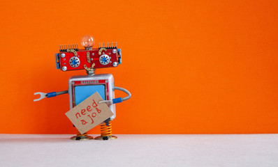 Job search concept. Robot wants to get a job. Funny unemployed robotic character with a cardboard sign and handwritten text Job wanted. Orange background, copy space